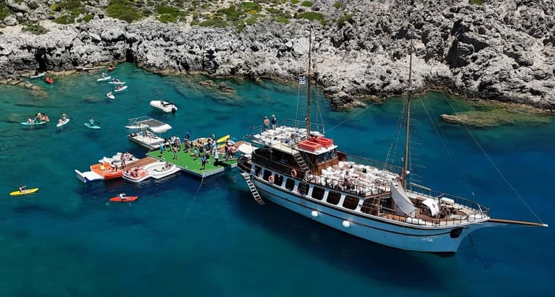 Rhodes: Gulet Trip with Food, Drinks, SUP, Kayak & Swimming - The first swim at Anthony Quinn Bay