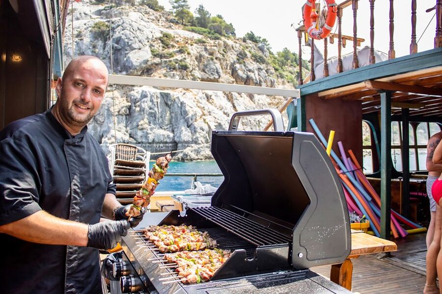 Rhodes: Sunset Cruise with Greek BBQ and Unlimited Drinks - What dinner is like on the Greek BBQ option