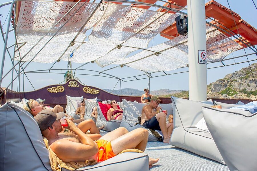 Rhodes: Sunset Cruise with Greek BBQ and Unlimited Drinks - The sunset return to Rhodes Town