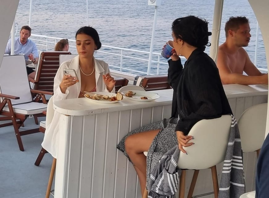 Rhodes: Sunset Cruise with Live Music, Wine & Greek Buffet - Starting at Mandraki Port