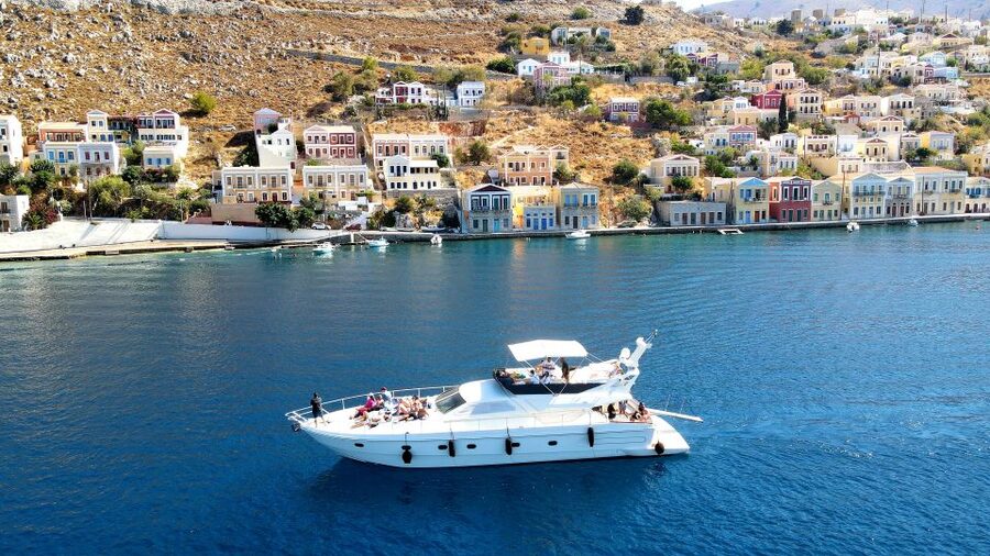 Rhodes: Symi Yacht Tour with Unlimited Drinks and Transfer - Arriving in Symi Yalos