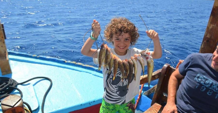 Rhodes Town: Fishing Boat Trip with Fish Meal and Swim Stops - Rhodes Town from the water