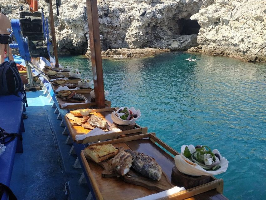 Rhodes Town: Fishing Boat Trip with Fish Meal and Swim Stops - Who will get the most from this Rhodes outing
