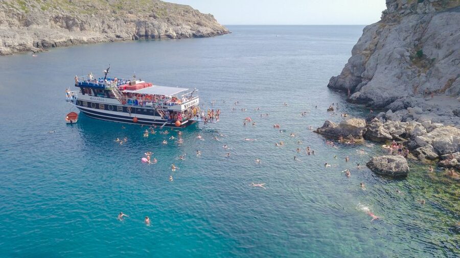 Rhodes Town: Scenic Cruise to Lindos with Swim Stops - Sailing past Rhodes’ east-coast sights