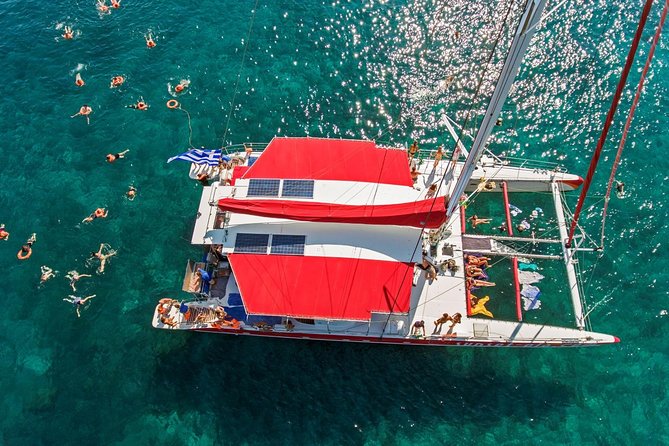 Sailing Catamaran Cruise in Santorini with BBQ, Drinks and Transfer - Swimming at the Hot Springs