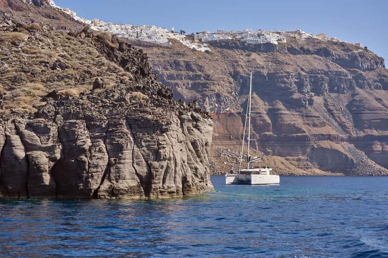 Santorini: Caldera Classic Catamaran Cruise w/ Meal & Drinks - Akrotiri Lighthouse and Indian Face Mountain