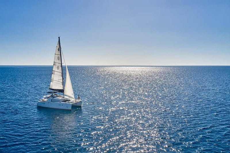 Santorini: Caldera Classic Catamaran Cruise w/ Meal & Drinks - Nea Kameni: volcanic rock and sulfur water