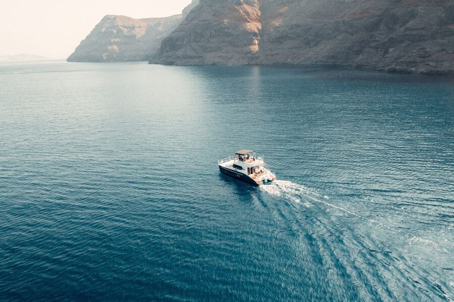 Santorini: Caldera Private Power Catamaran Cruise - The volcano and its warm springs