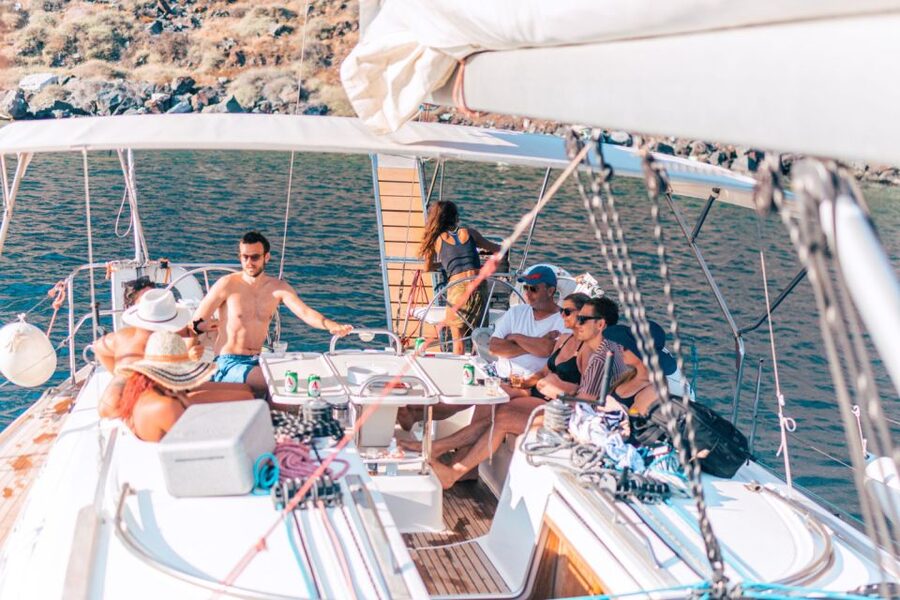 Santorini Caldera: Sunset Sailing Cruise with Meal - Swimming and snorkeling at Mesa Pigadia