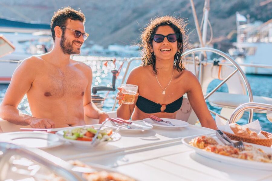 Santorini Caldera: Sunset Sailing Cruise with Meal - Palea Kameni and the volcanic swimming stop