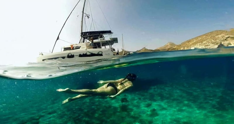 Santorini: Catamaran Cruise with Fresh Meal & Open Bar - Red Beach and White Beach from the water