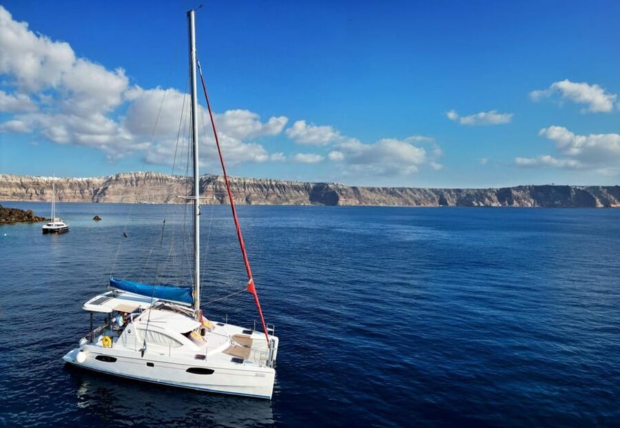 Santorini: Catamaran Cruise with Greek BBQ and Drinks - Setting sail from Vlychada Marina