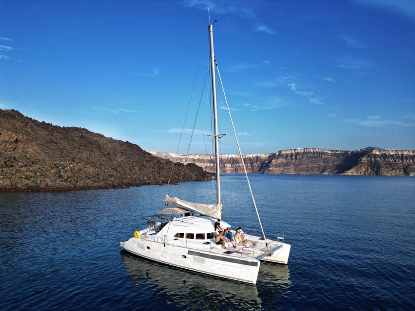 Santorini: Catamaran Cruise with Greek BBQ and Drinks - The caldera and Palea Kameni hot springs