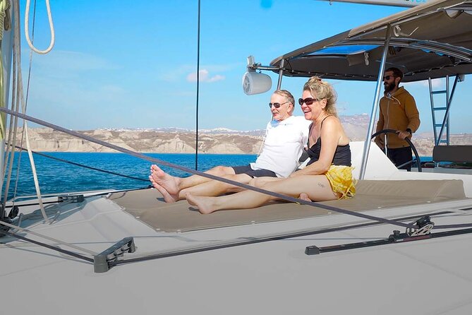 Santorini Catamaran Cruise with Greek Meal, Open-Bar and Sunset - Red Beach and the southern coast