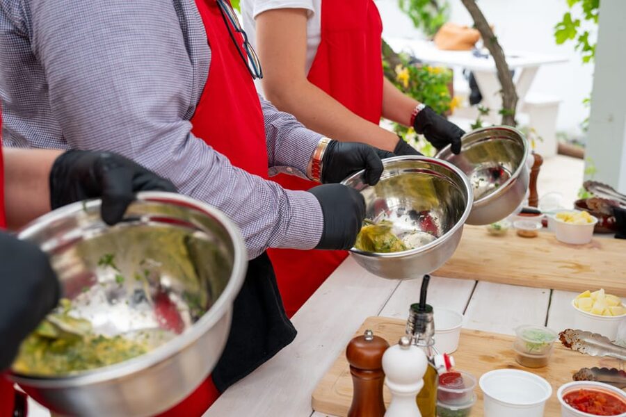 Santorini: Cooking Class with Lunch and Wine Tasting - Cooking Greek food beside Kamari’s Black Beach