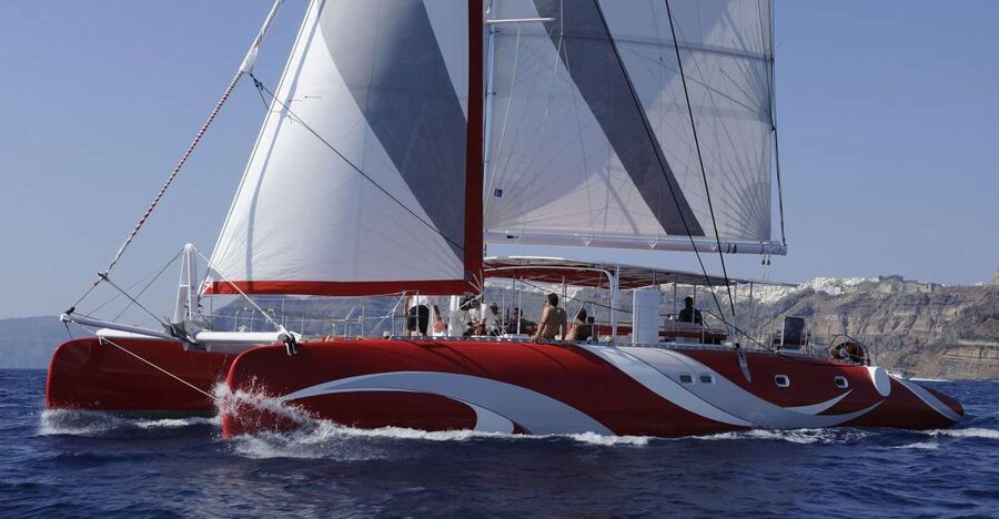 Santorini: Dream Catcher 5-hour Sailing Trip in the Caldera - Passing Indian Head Mountain and the Venetian Lighthouse