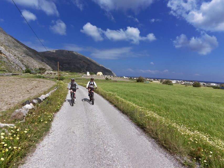 Santorini: Electric Mountain Bike Adventure - Returning past Vlichada Port to the beach