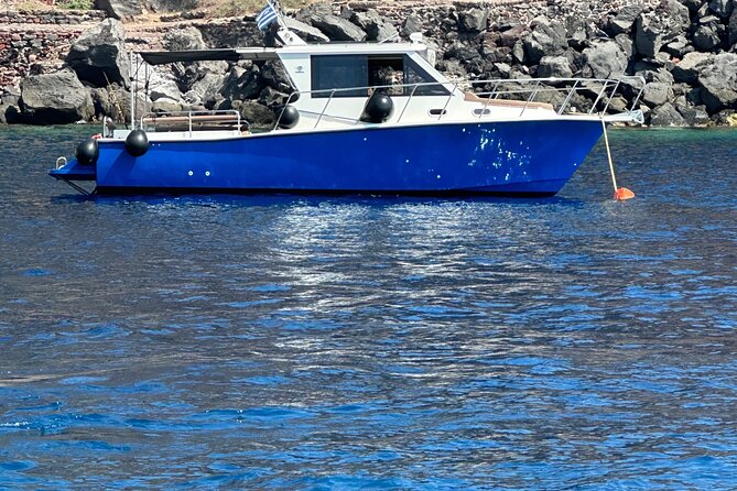 Santorini Fishing Private Cruise boat tour - BBQ, Snorkeling - Starting near Ammoudi Bay and heading toward the volcano