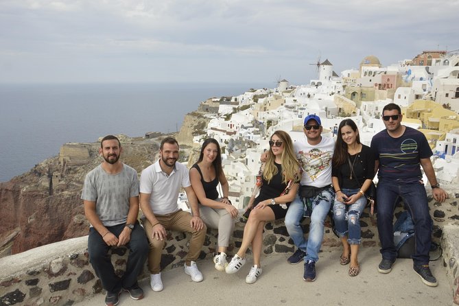 Santorini Highlights and Venetian Castles Small-Group Day Tour - Firostefani frames the classic Santorini view