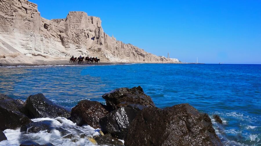 Santorini: Horseback Riding Tour on the Beach - Through vineyards, volcanic ground, and local paths