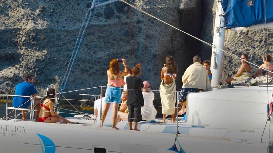 Santorini: Luxury Caldera Cruise with Full Greek Meal - Pickup across Santorini, with one timing warning