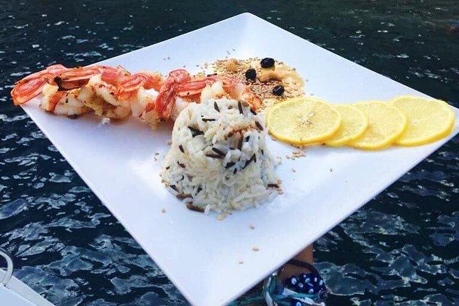 Santorini Luxury Catamaran Sunset Cruise with BBQ, Drink and Transfer - Why seeing Santorini from the sea changes the picture