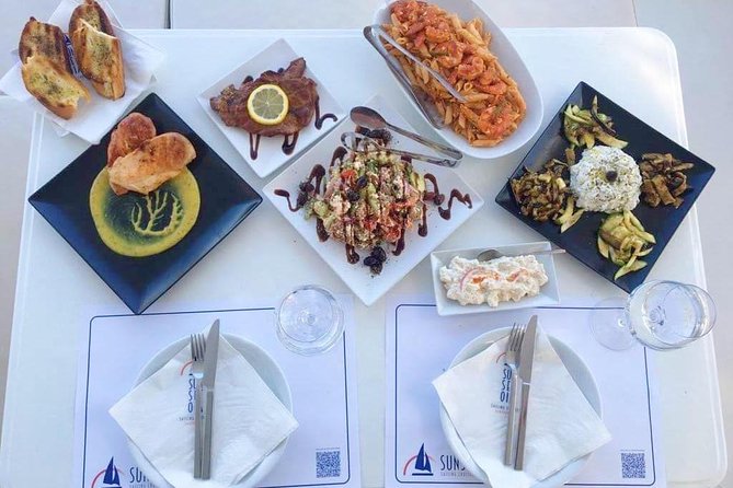Santorini Luxury Catamaran Sunset Cruise with BBQ, Drink and Transfer - Sailing beside the volcano and Palea Kameni
