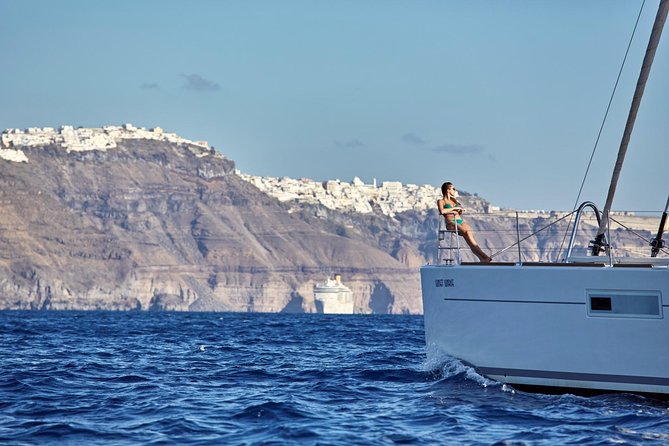 Santorini Luxury Sailing Catamaran Cruise with BBQ, Drinks and Transfer - White Beach, barbecue, and the longest stop
