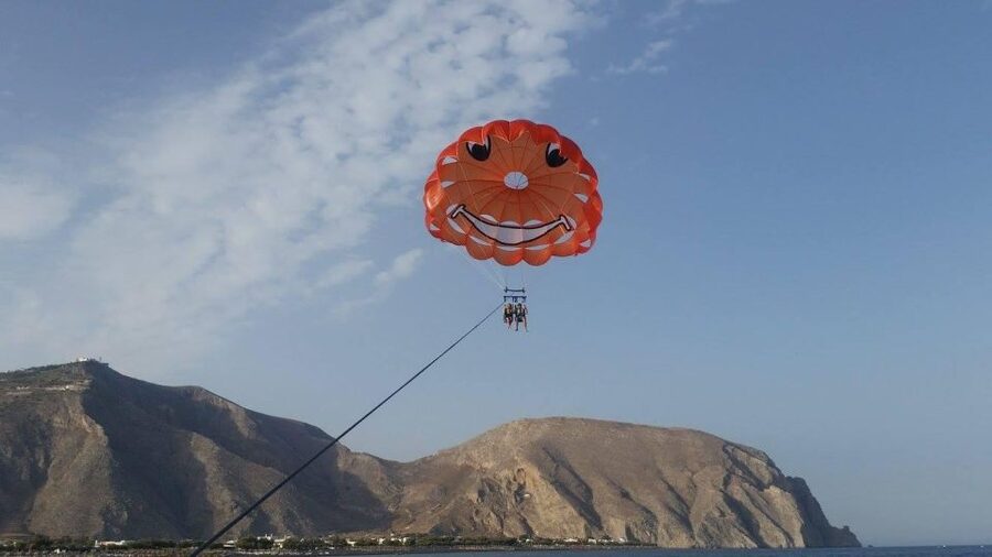Santorini: Parasailing Flight Experience at Black Beach - Taking off from Santorini’s Black Beach