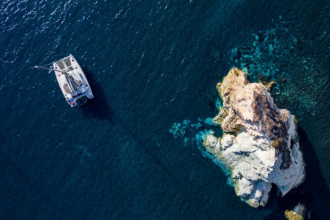 Santorini Platinum Catamaran Cruise with Meal, BBQ and Open Bar - Red Beach and White Beach: dramatic scenery, brief viewing time