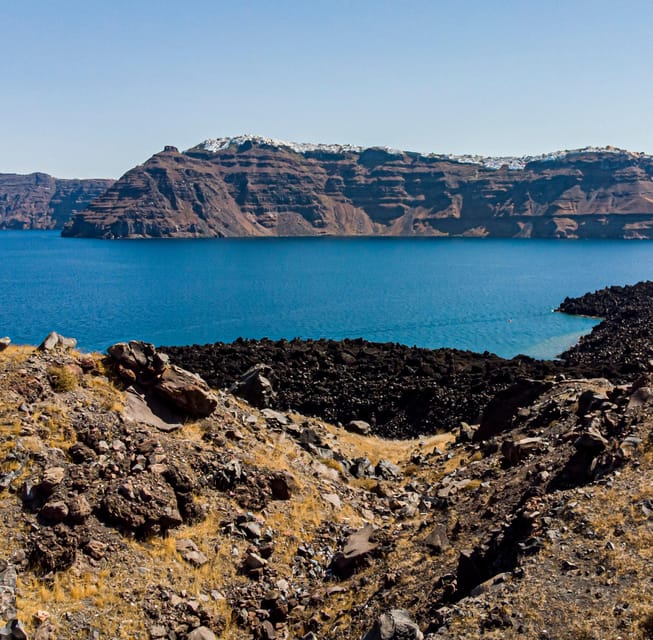 Santorini Port: 3 Hour Cruise to Volcano and Hot Springs - Sailing out from Fira’s old harbor