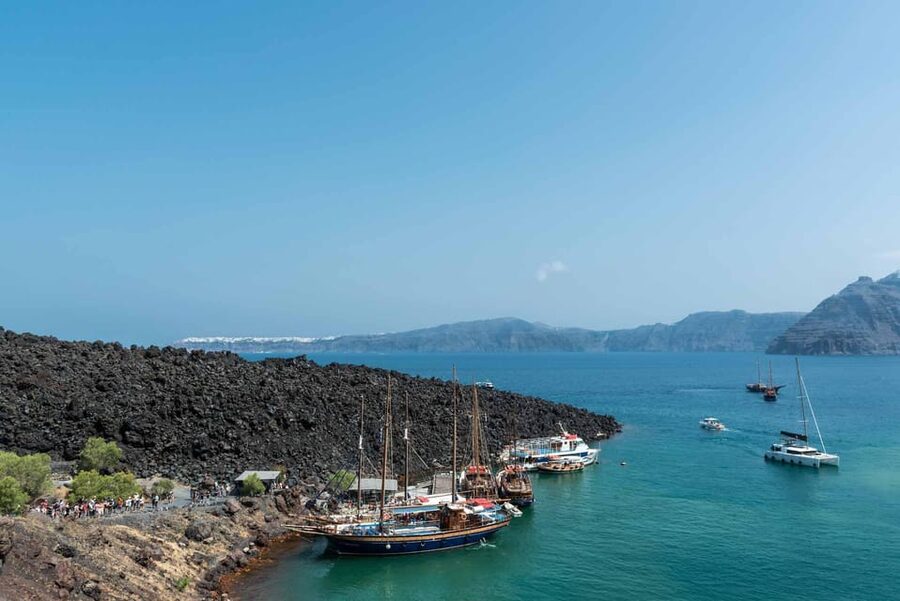 Santorini Port: Cruise to Volcano, Hot Springs & Thirassia - Hiking Nea Kameni’s black volcanic ground