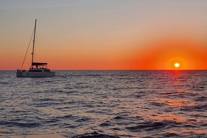 Santorini Private Catamaran Cruise with BBQ, Open Bar & Transfers - Thirasia and the view from sea level