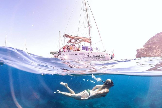 Santorini Private Catamaran Cruise with BBQ, Open Bar & Transfers - White Beach and Mesa Pigadia for swimming