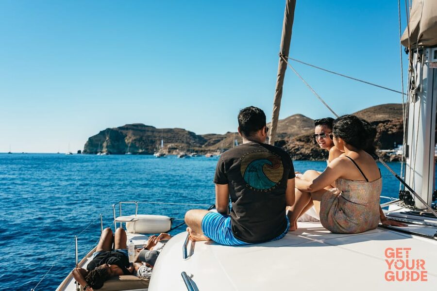 Santorini: Private Catamaran Tour with BBQ Meal and Drinks - Indian Rocks, the Venetian Lighthouse, and the caldera