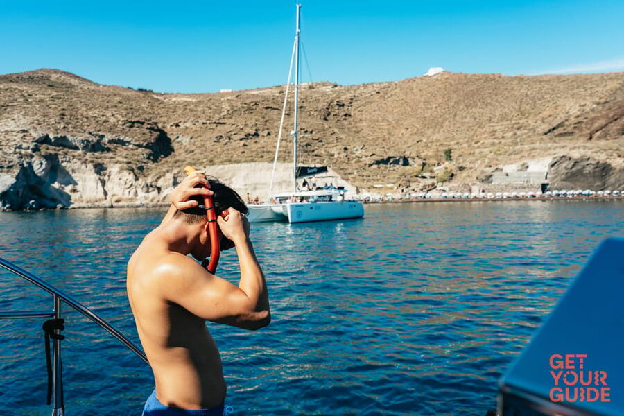 Santorini: Private Catamaran Tour with BBQ Meal and Drinks - A Greek barbecue served on the boat