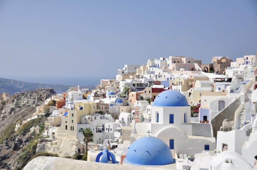 Santorini: Private Customizable Tour with Flexible Lenghts - Black sand and red rock along the volcanic coast