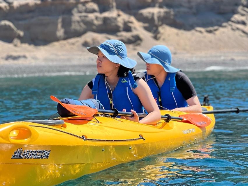 Santorini: Sea Caves Kayak Trip with Snorkeling and Picnic - Snorkeling in clear water