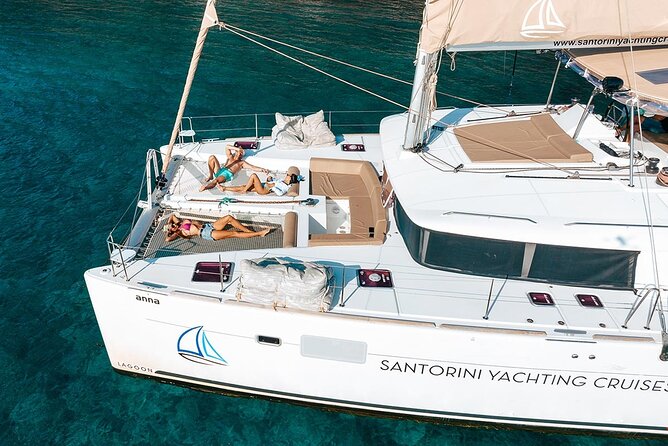 Santorini Sunset Sailing Cruise: Dinner, BBQ, Open Bar, Transfers - White Beach, Indian Rocks, and the Venetian Lighthouse