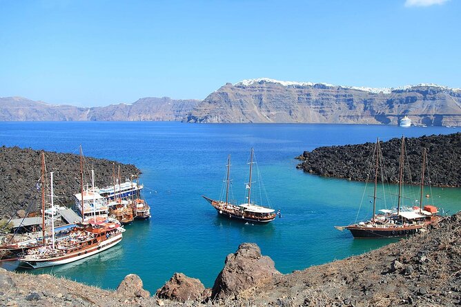 Santorini Sunset Sailing Cruise: Dinner, BBQ, Open Bar, Transfers - Mesa Pigadia, swimming, snorkeling, and dinner