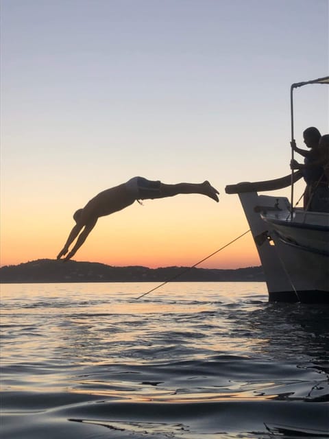 Skiathos: Boat Cruise with Dinner & Sunset Viewing - Caves, Castro islands, and Skiathos Castle