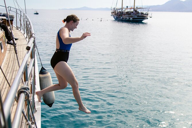 Sunset Dinner Cruise: Sunset, Swim, Drinks, and Dinner Onboard - What the $145.97 price includes