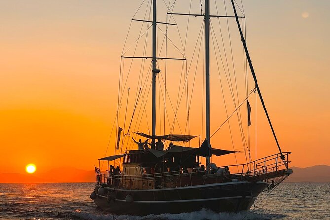 Sunset Dinner Cruise: Sunset, Swim, Drinks, and Dinner Onboard - Ydrousa and the first swim stop