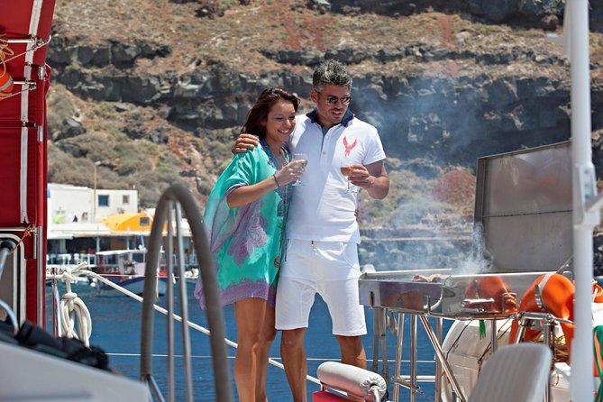 Sunset Sailing Catamaran Cruise in Santorini with BBQ and Drinks - Sailing beside the volcano and Palea Kameni