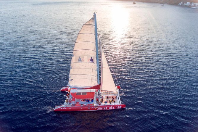Sunset Sailing Catamaran Cruise in Santorini with BBQ and Drinks - What the crew adds to the day