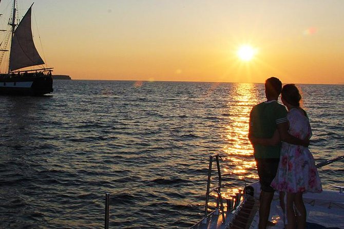 Sunset Sailing Catamaran Cruise in Santorini with BBQ and Drinks - Swimming near the hot springs