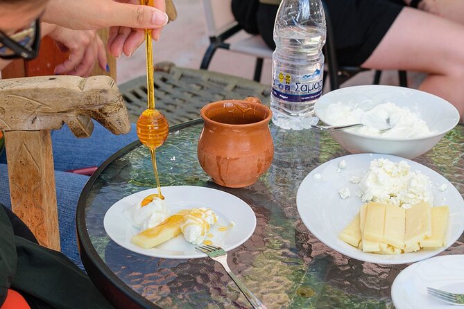 The 7 Villages of Apokoronas Tour – Explore East Chania Mainland - Emprosneros brings bread, olive oil, and local sweets