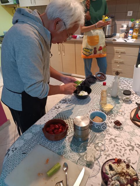 Thessaloniki: Cooking & Dining Experience with Greek Family - A dance lesson and a map of Greece