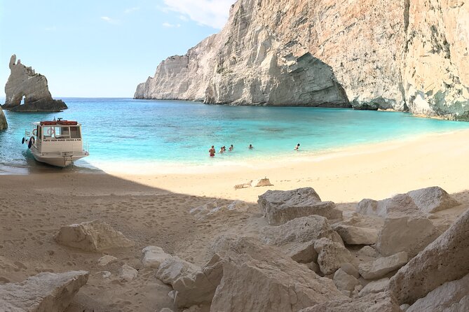 Zakynthos boat tour:Shipwreck& Local blue caves with 3 Swim Stops - Three swim stops, with time for snorkeling